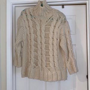 Open cable knit sweater